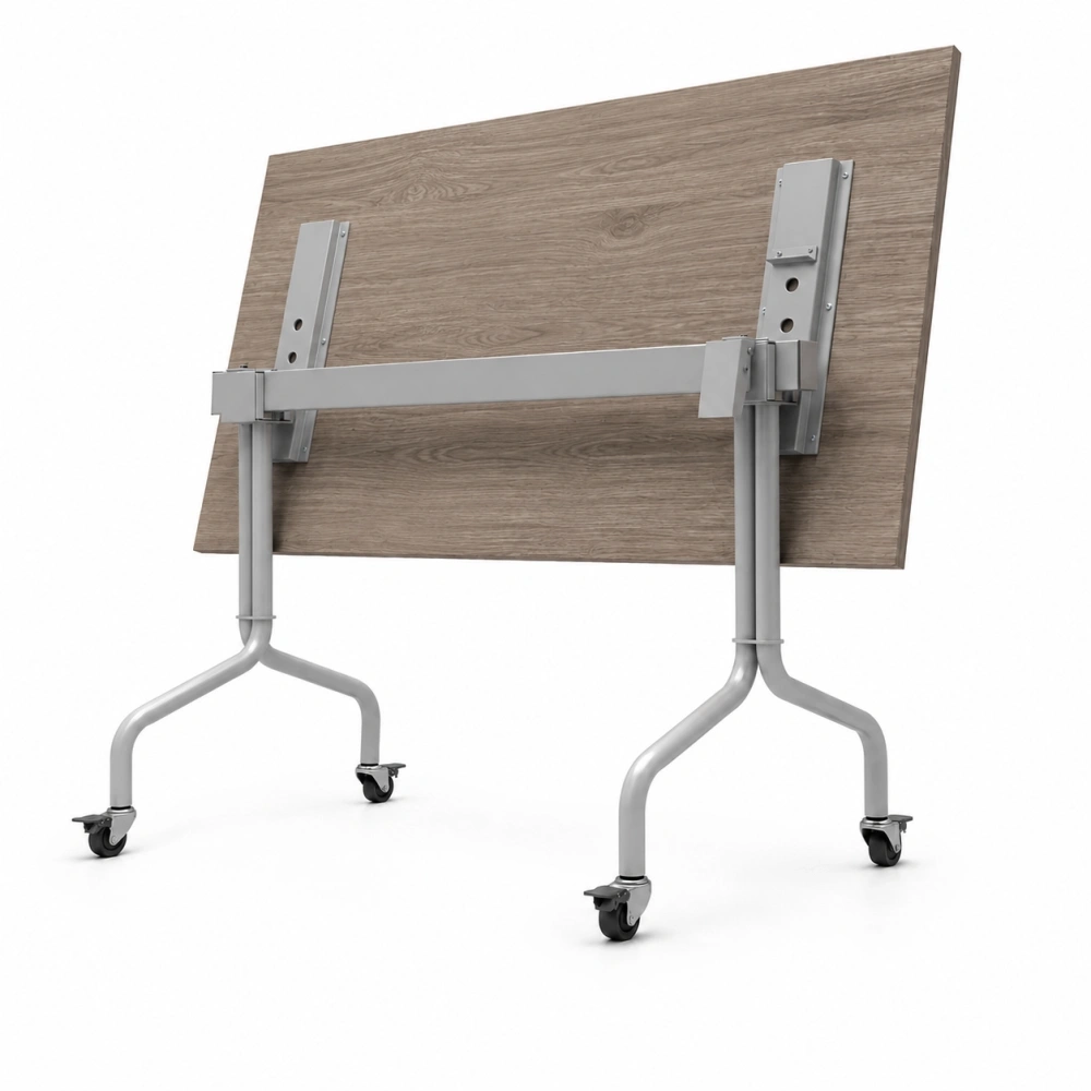 Mesa abatible metálica con ruedas fabricada en tubo redondo de 1-1/4 calibre 16 y superficie en MDF laminado para universidades e instituciones educativas.